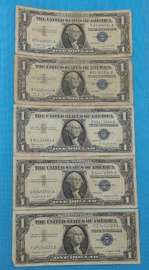 FIVE 1957A ONE DOLLAR SILVER CERTIFICATES