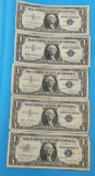FIVE 1957B ONE DOLLAR SILVER CERTIFICATES