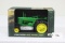 #116 1939 JOHN DEERE BW TRACTOR 1/8-SCALE, SIGNED “JOSEPH L. ERTL” (NIB AND SHIPPING BOX”