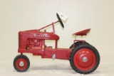 #140 1952 FARMALL M MID-SIZE HIGH POST PEDAL TRACTOR