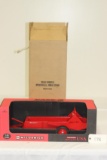 #178 McCORMICK SPREADER 1/8-SCALE, SIGNED “JOSEPH L. ERTL” (NIB WITH SHIPPING BOX)