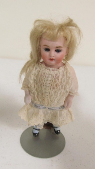 7" French Bisque doll with blinking eyes