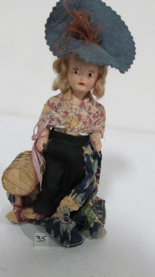 7" Bisque doll with handpainted face