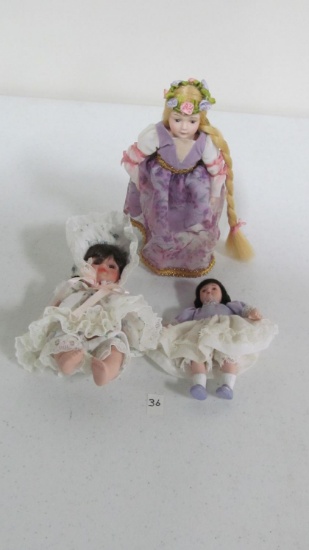(3) 5.5", 5", & 7.5" porcelain dolls