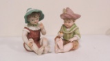 Pair of bisque piano babies 12.25