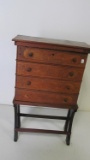 Walnut Victorian 4-drawer sewing cabinet with swing out drawers, newer base, & (3) added holes