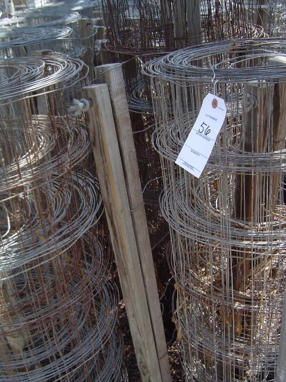 ROW APPROXIMATELY (32) WIRE FENCE ROLLS