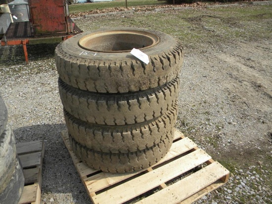 15-1: (4) 8.25-20 TRUCK TIRES AND RIMS