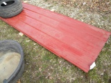 45-1: PILE OF RED METAL SIDING