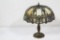 TABLE LAMP & FANCY FILIGREE WORK SHADE W/8 SLAG GLASS CARMEL & PURPLE PANEL