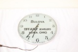 BULOVA ALUMINUM ROUND FRAME WALL CLOCK, ADVERTISING TIFFANY JEWELERS, XENIA