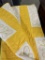 YELLOW AND WHITE QUILT CROSS STITCHED FLORAL PATTERN