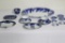 LOT OF FLOW BLUE CUPS, SAUCERS, BUTTER PATS, SERVING PLATTER, (3) SMALL PL