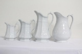 (4) IRONSTONE PITCHERS, 12
