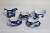 (5) PCS FLOW BLUE INCLUDING CUPS & SAUCERS, GRAVEY BOAT, WASTE BOWL