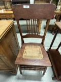 PAIR OF OAK PRESSED BACK CANED SEAT CHAIRS