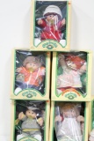 (6) CABBAGE PATCH DOLLS, (5) IN ORIGINAL PACKAGE, (2) CLOTHES, (2) FOLDERS
