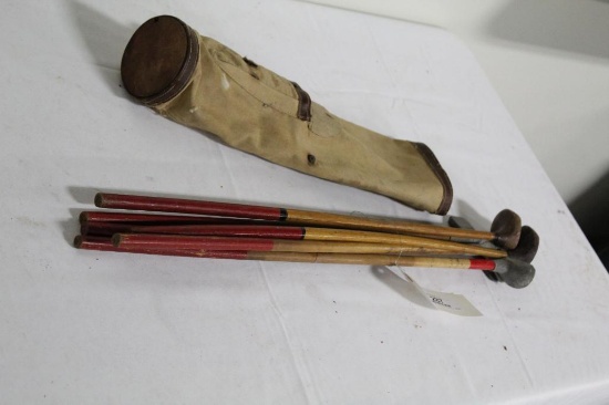 CANVAS & LEATHER BAG AND 6 TOY CLUBS