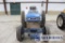 31-8: FORD NEW HOLLAND MODEL 1920 TRACTOR, 5125 HRS., DIESEL, RUNS, OWNED B