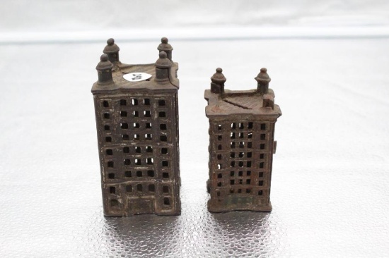 (2) BUILING FORM CAST IRON BANKS, SMALLER ONE MISSING TWO FINIALS