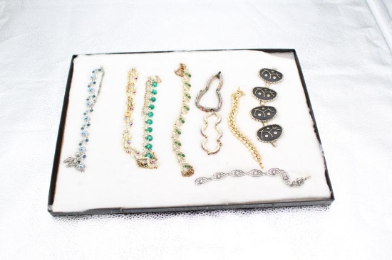 DISPLAY CASE OF VINTAGE COSTUME JEWELRY