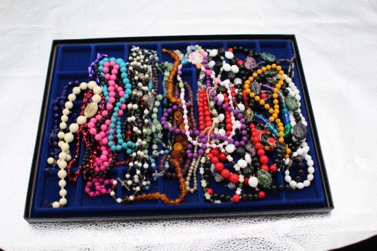 DISPLAY CASE OF VINTAGE COSTUME JEWELRY