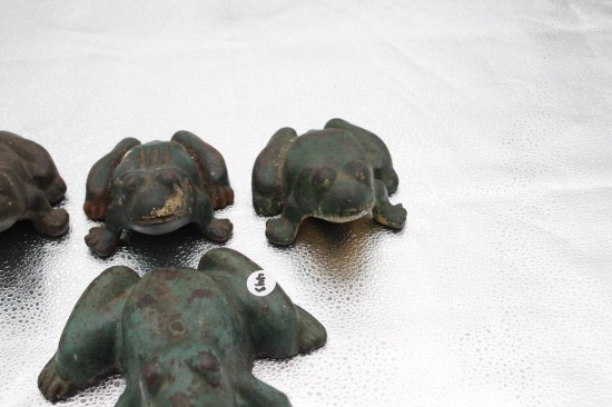 (4) CAST IRON FROG DOOR STOPS IN VARIOUS SIZES, ONE LACKING PAINT