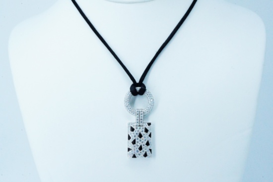 Cartier 2.85ctw Diamond, Onyx, 18K and Satin Necklace