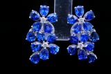 9.00ctw Blue Sapphire, 0.20ctw Diamond and 18K Earrings
