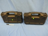 Two hard plastic padded pistol cases