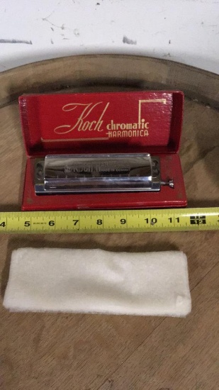 Vintage harmonica in original box