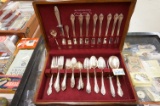 55 Pieces of Rogers Silver Plate in flame mahogany box, bought by Mary Hradil (my grandmother)