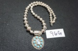 Sterling Silver Turquoise Pendant by Navajo Artist Kathleen Chavez, with handmade Beaded Necklace