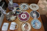 Plate collection (Queen Mum, Lady Diana) with really bright Hobby Light and Wooden Table. All One $