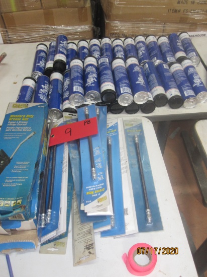 Lot of grease guns, hoses and grease