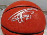 We Think This is Signed by Tim Duncan (#21), Adam Silver Spalding Ball COA sticker is unrecoginzable