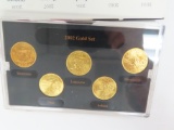 (2) 2002 Gold Edition State Quarter Collection, BU layered in 24K Gold. five coins. $1.25 face value