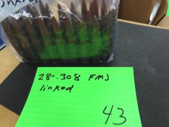 Twenty-Eight (28) .308WIN FMJ Cartridges LINKED TOGETHER.