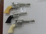 Three (3) X The Money: Toy Cap Guns. Note: Action does not perform on One. need cleaning