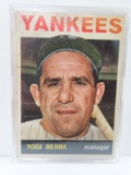 LOW GRADE: 1964 Topps Yogi Berra New York Yankees #21 Baseball Card, creases and foreign substance
