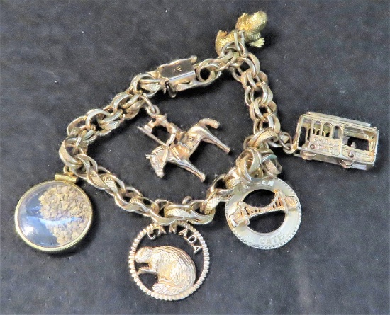 14K GOLD Charm Bracelet with 14K Gold Charms, Total Weght = 1.22 Troy Ounce, 38 Grams