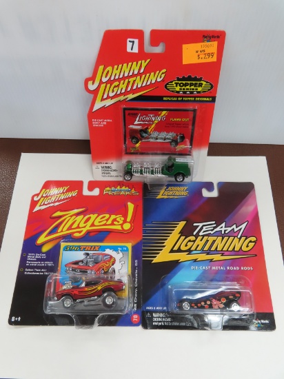 Three (3) Johnny Lightning For One Money: 2000 Flame Out, 2000 Pink Panther, 2006 396 TRIX