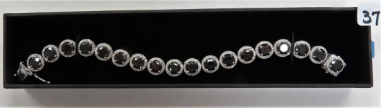 $34,880 Est. Replacement Value: 14KT White Gold Ladies Black and White Diamond Bracelet. 34.08 ct.