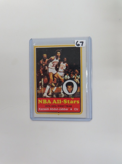 1973-74 Topps #50 Kareem Abdul-Jabbar. (great shot of him posting up Wilt Chamberlain)