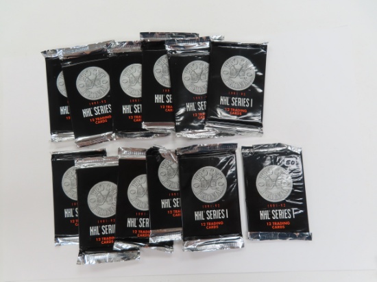 Twelve (12) 1991-92 NHL Series I Unopened Packs, All One Money