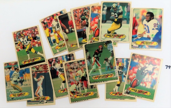 Fourteen (14) 1983 Topps NFL Stickers