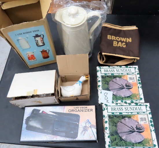 Table Lot, All One Money: brass Sundials, water pitcher (old skool), sun visor organizer $28.45 SHIP