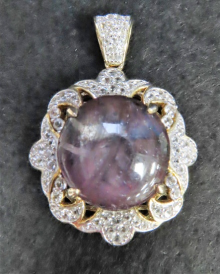 28.62 CTW natural ruby and colorless sapphire pendant, Retail Replacement Value $12,188 as shown.