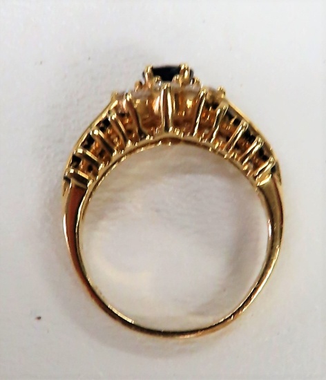$3390 Appraisal Value: Ladies 14K Yellow Gold Ring Prong Set containing one round shaped blue