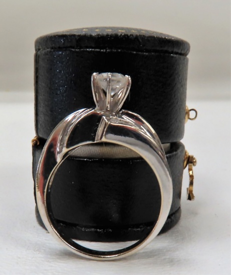 $2515 Appraisal Value: Ladies 14K White Gold Prong and Channel Set containting (1) Round shaped
